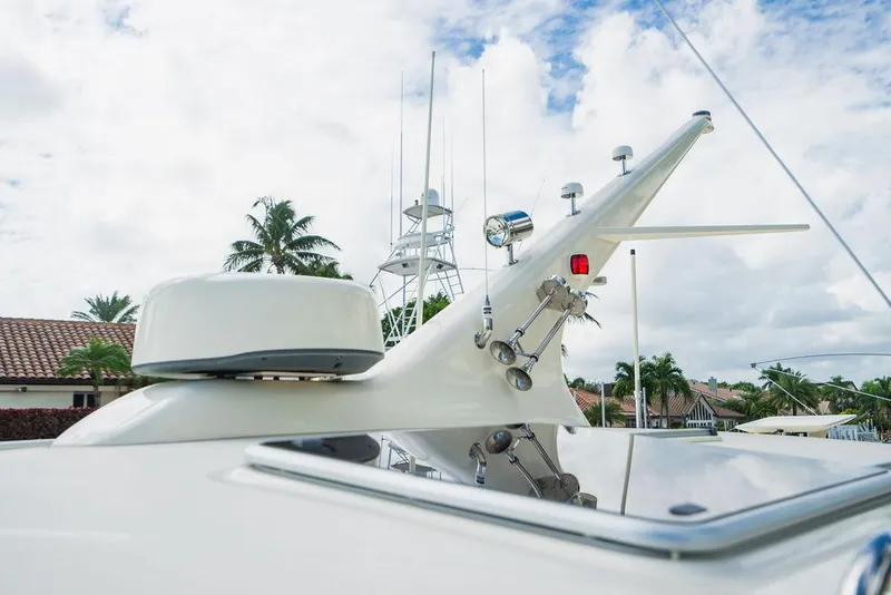 Slide: The Image of 2015 Palm Beach Motor Yachts PB52, close-up of radar and antenna equipment. - 26