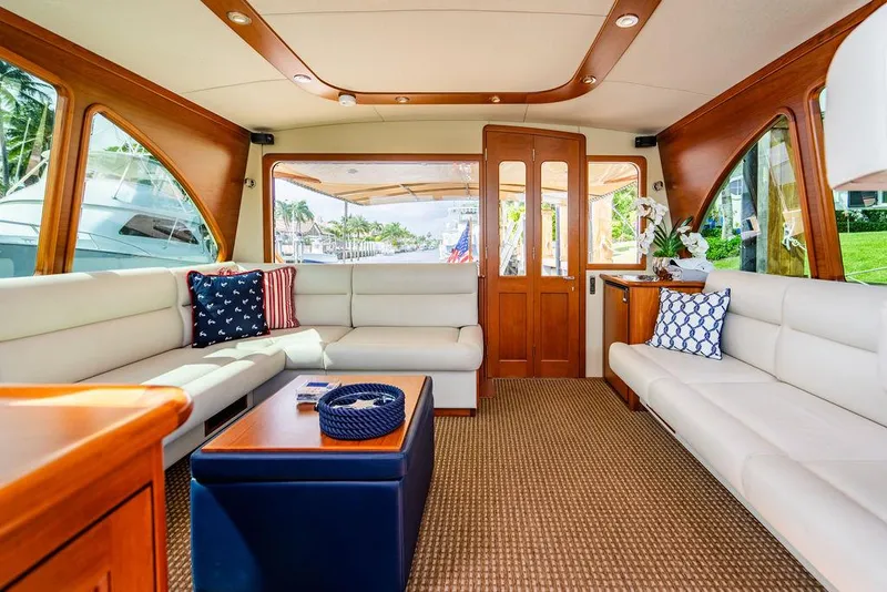 Slide: The Image of Luxurious interior of 2015 Palm Beach Motor Yachts PB52 with elegant seating and decor. - 28