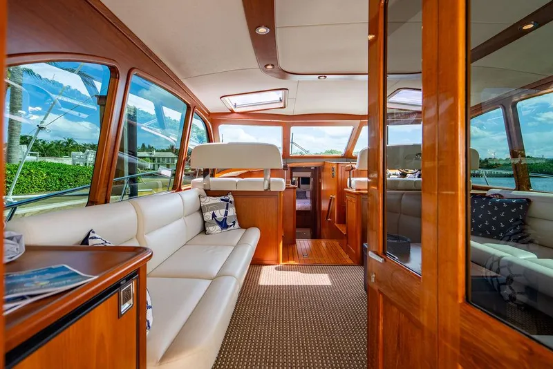 Slide: The Image of Luxurious interior of 2015 Palm Beach Motor Yachts PB52 with elegant wood finish. - 29