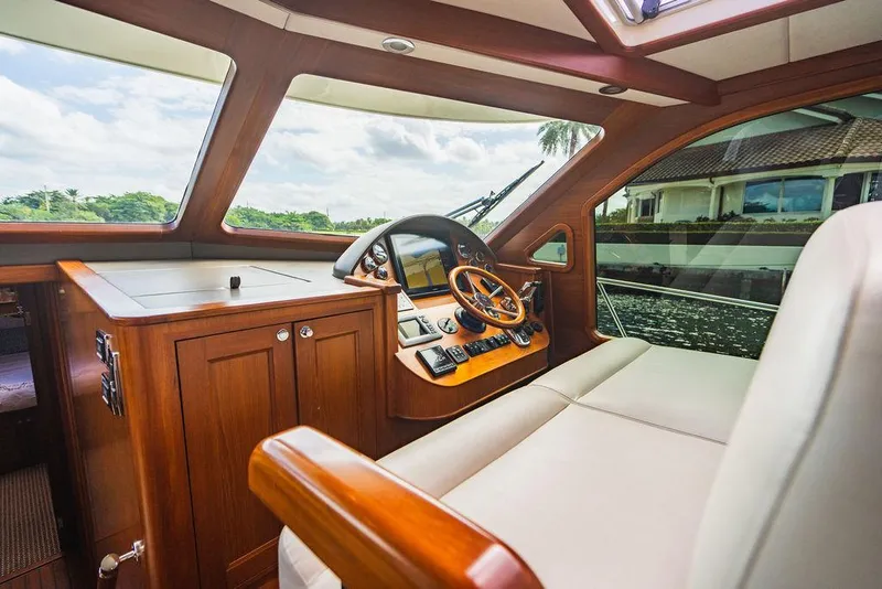 Slide: The Image of Luxurious interior of 2015 Palm Beach Motor Yachts PB52 with elegant wood finish. - 3