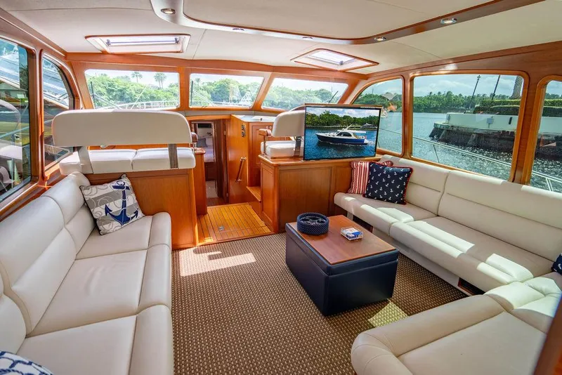Slide: The Image of Luxurious interior of 2015 Palm Beach Motor Yachts PB52 with elegant seating and scenic views. - 30