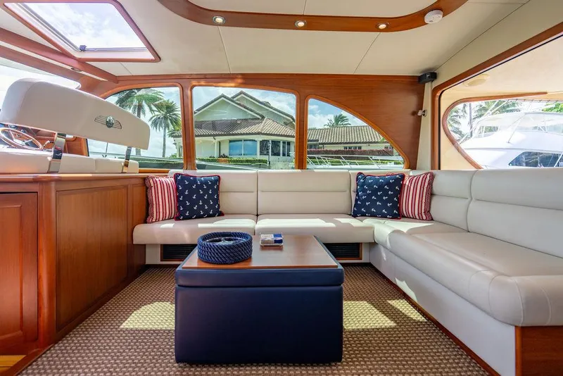 Slide: The Image of Luxurious interior of 2015 Palm Beach Motor Yachts PB52 with elegant seating and decor. - 31