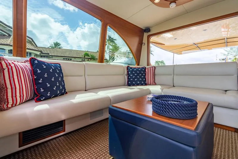 Slide: The Image of Luxurious interior of 2015 Palm Beach Motor Yachts PB52 with nautical-themed cushions. - 32