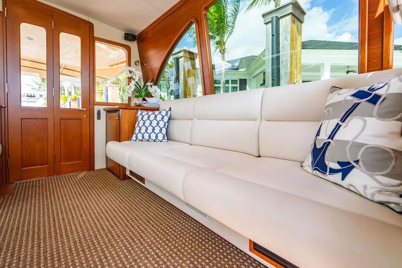 Slide: The Image of Luxurious interior of 2015 Palm Beach Motor Yachts PB52 with elegant seating and decor. - 35