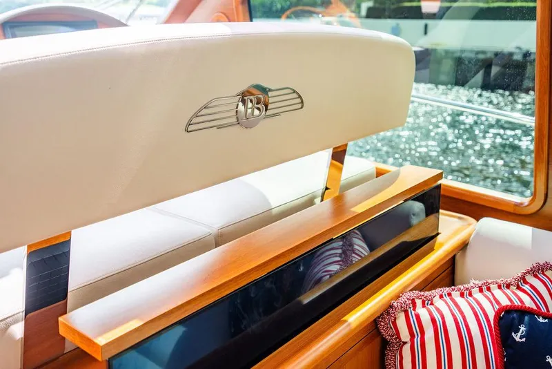 Slide: The Image of Interior of 2015 Palm Beach Motor Yachts PB52, featuring elegant seating and nautical decor. - 36