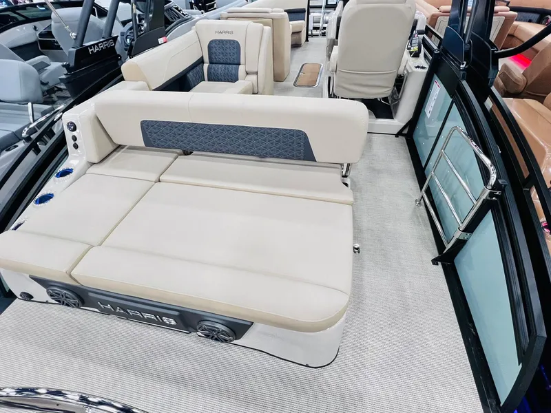 Slide: The Image of 2025 Harris Solstice 250 boat interior with luxurious seating and modern design. - 10