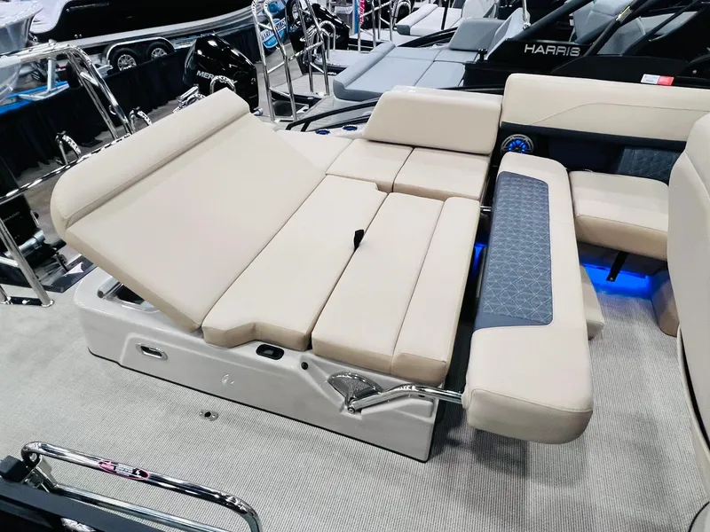 Slide: The Image of 2025 Harris Solstice 250 boat interior with adjustable seating and modern design. - 13