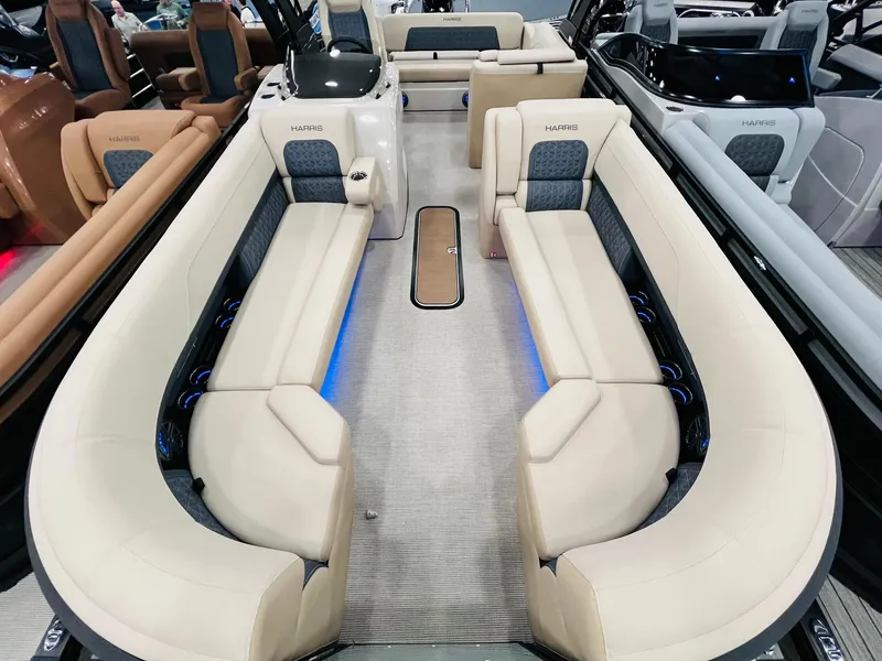 Slide: The Image of Luxurious interior of 2025 Harris Solstice 250 pontoon boat with plush seating. - 6