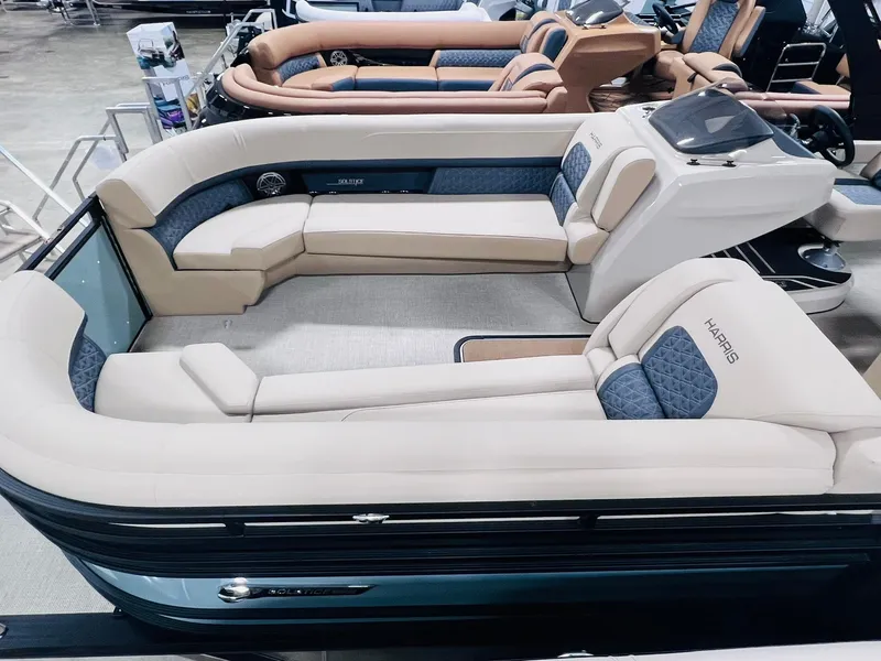Slide: The Image of 2025 Harris Solstice 250 pontoon boat with luxurious seating and modern design. - 9