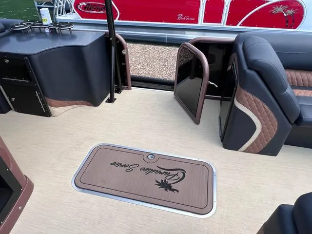 Slide: The Image of Interior of 2025 Aloha 30' Paradise Sundeck boat with luxurious seating and flooring. - 37