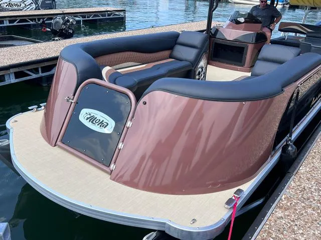 Slide: The Image of 2025 Aloha 30' Paradise Sundeck boat with spacious seating at a dock. - 40
