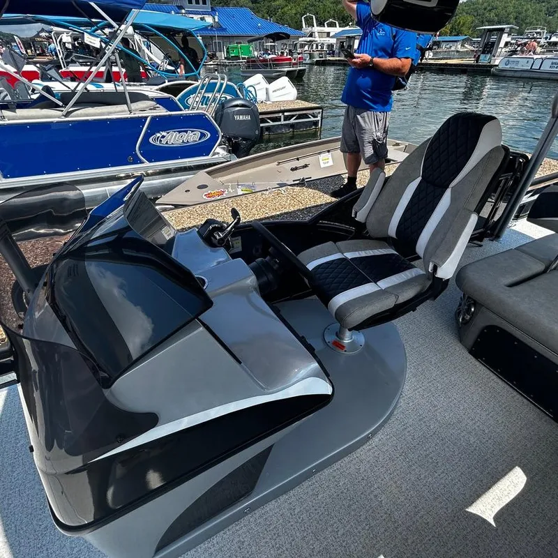 Slide: The Image of 2025 Aloha 30' Paradise Sundeck boat interior with modern seating and control panel. - 6