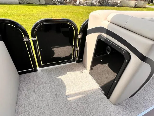 Slide: The Image of 2025 Aloha 23' Paradise Arch Sport Tower interior with sleek seating and modern design. - 23