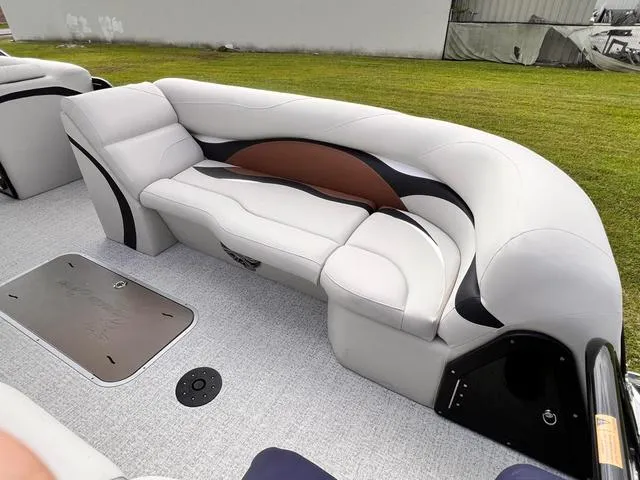 Slide: The Image of Luxurious seating on 2025 Aloha 23' Paradise Arch Sport Tower boat, featuring sleek design and comfort. - 31