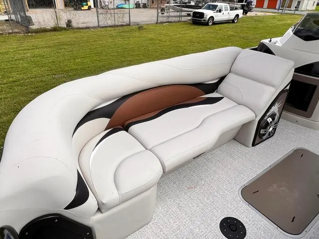 Slide: The Image of 2025 Aloha 23' Paradise Arch Sport Tower boat with stylish seating and modern design. - 8