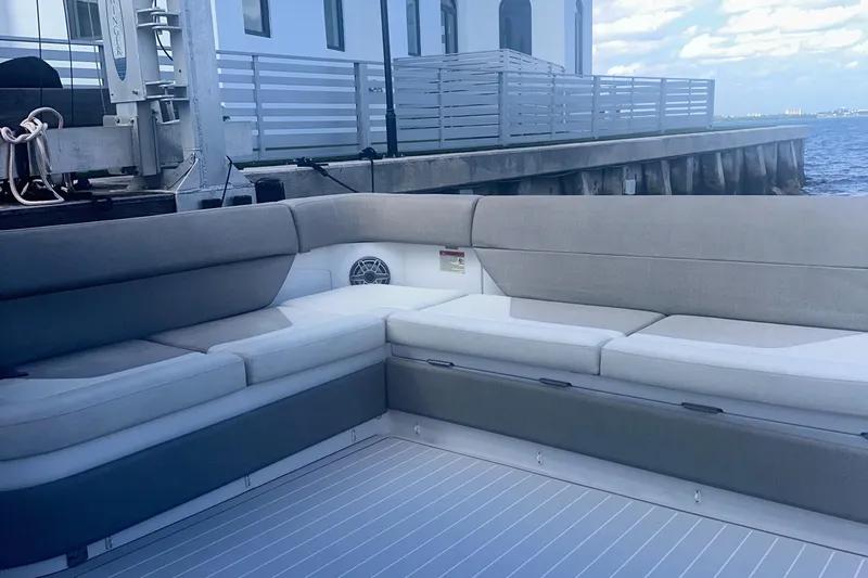 Slide: The Image of 2021 Azimut Verve 47 yacht interior with elegant seating by the dock. - 28