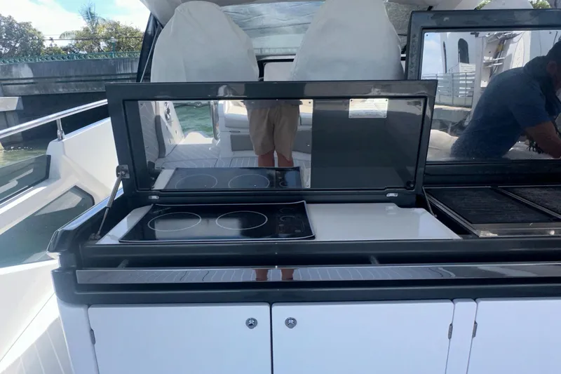 Slide: The Image of Outdoor kitchen on 2021 Azimut Verve 47 yacht with stovetop and grill. - 30