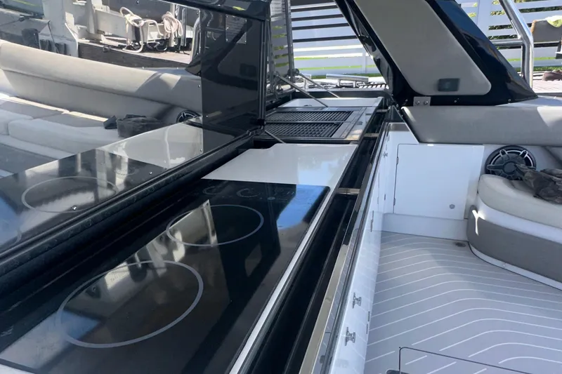 Slide: The Image of 2021 Azimut Verve 47 yacht interior with sleek kitchen and modern design. - 32