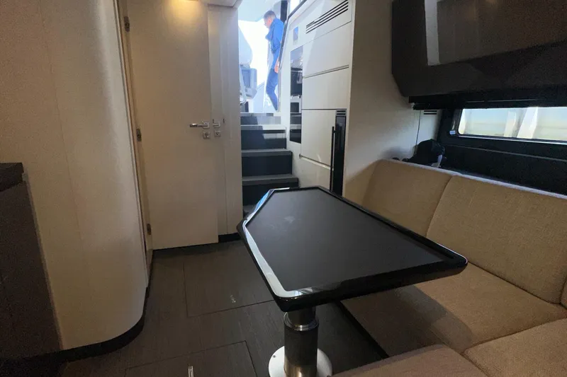 Slide: The Image of Interior of 2021 Azimut Verve 47 yacht with modern seating and table. - 33