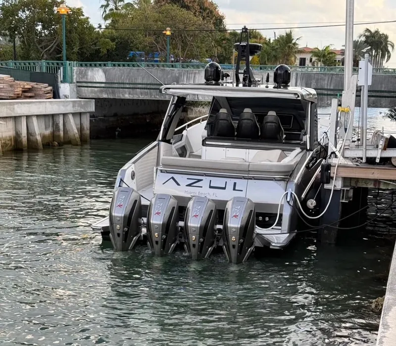 Slide: The Image of Azimut Verve 47 yacht docked, rear view with multiple engines, 2021 model. - 4