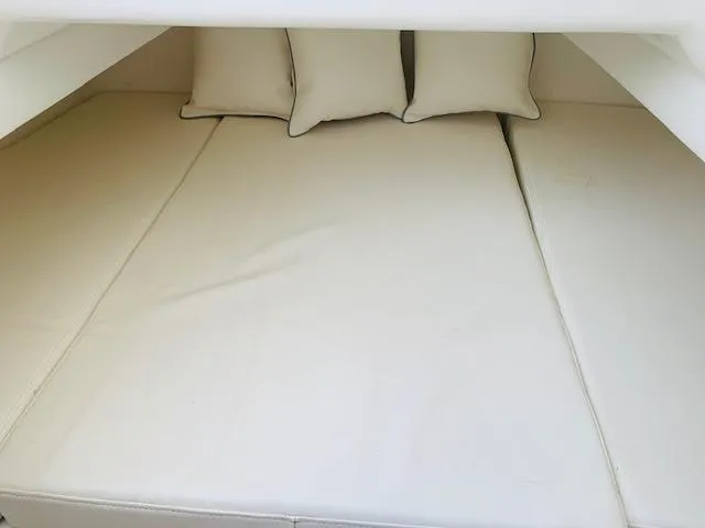 Slide: The Image of 2020 SeaHunter 39 Tournament cabin interior with cushions and life preserver. - 14