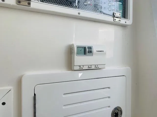 Slide: The Image of Built-in Avanti microwave in 2020 SeaHunter 39 Tournament boat kitchen. - 17