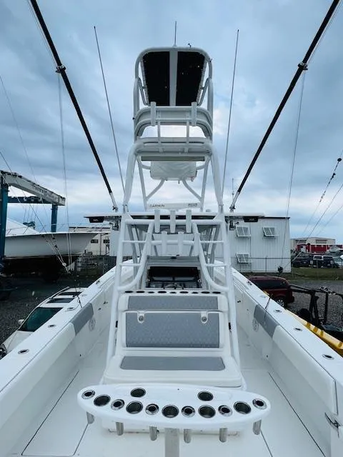 Slide: The Image of 2020 SeaHunter 39 Tournament boat interior with rod holders and seating. - 21
