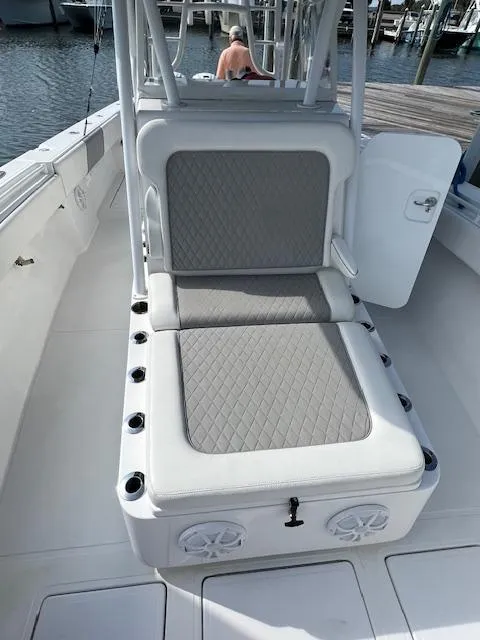 Slide: The Image of 2020 SeaHunter 39 Tournament boat, spacious deck with seating, docked at marina. - 5