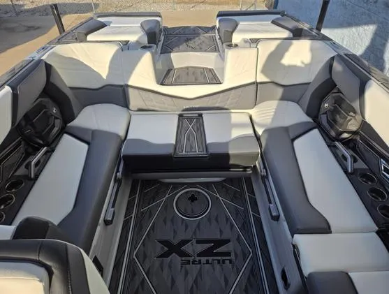 Slide: The Image of 2025 Tigé Ultré 23ZX boat interior with luxurious seating and modern design. - 15
