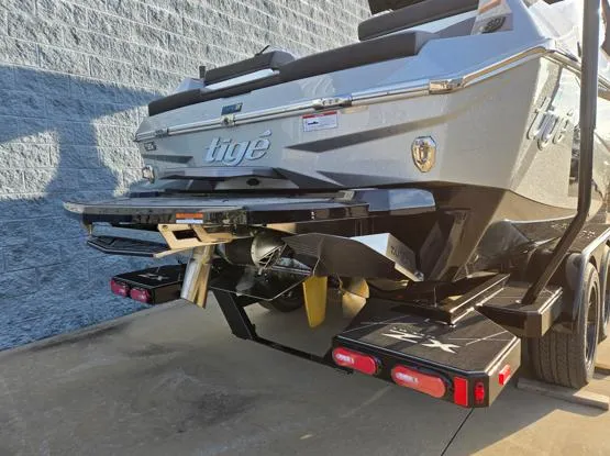 Slide: The Image of 2025 Tigé Ultré 23ZX boat rear view, showcasing sleek design and advanced features. - 18