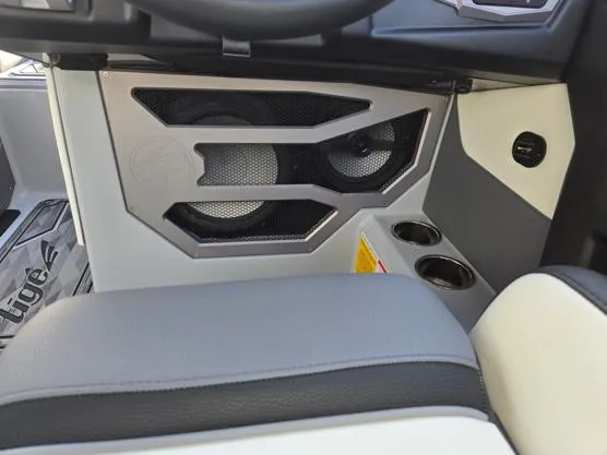 Slide: The Image of Interior of 2025 Tigé Ultré 23ZX boat featuring speakers and cup holders. - 4