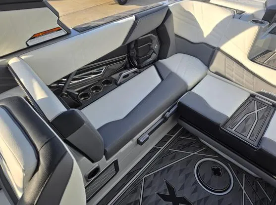 Slide: The Image of Luxurious interior of 2025 Tigé Ultré 23ZX boat with sleek seating and modern design. - 8