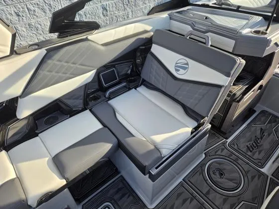 Slide: The Image of 2025 Tigé Ultré 23ZX boat interior with luxurious seating and modern design. - 9