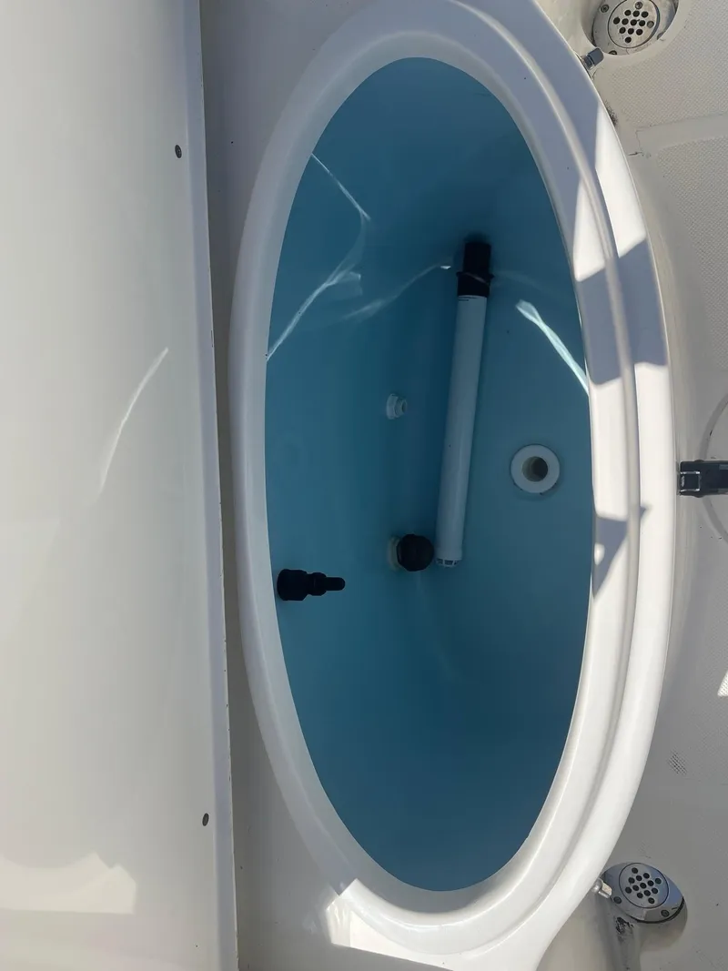 Slide: The Image of Livewell in 2022 Bulls Bay 230 Center Console boat, featuring clean design and functionality. - 11