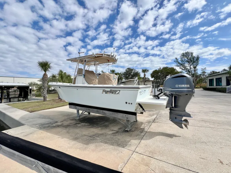 Slide: The Image of 2019 Parker 2300 Center Console boat with Yamaha engine on a sunny day. - 3