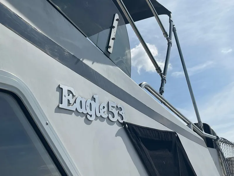 Slide: The Image of Transpacific Marine EAGLE 53 yacht, 2002 model, with clear sky background. - 11