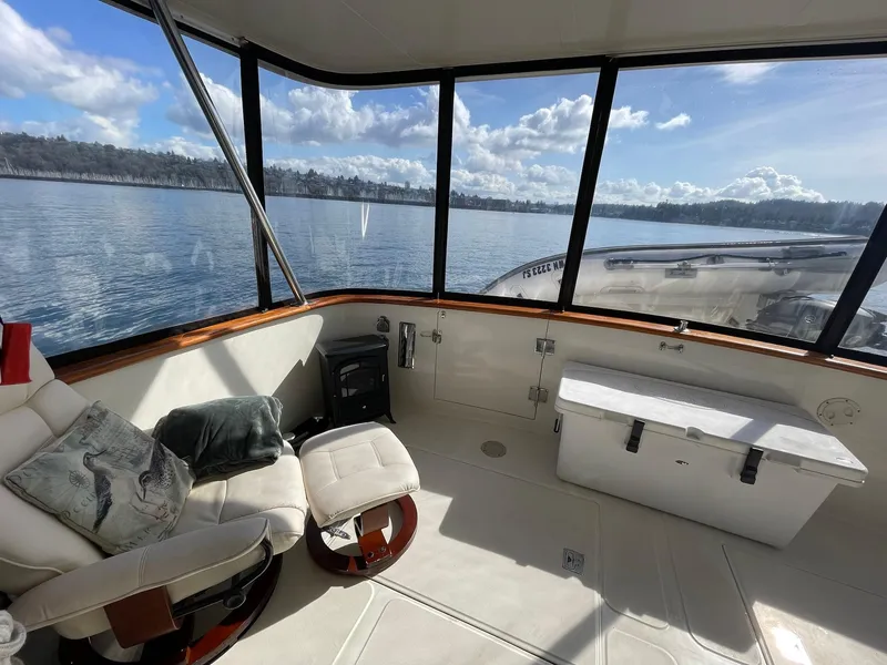 Slide: The Image of Interior view of 2002 Transpacific Marine EAGLE 53 yacht with scenic water backdrop. - 18