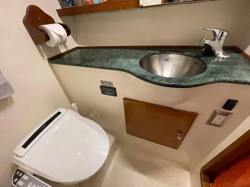 Slide: The Image of Bathroom interior of 2002 Transpacific Marine EAGLE 53 yacht with sink and toilet. - 35