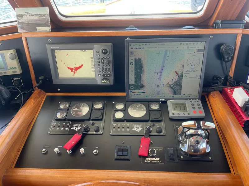 Slide: The Image of Control panel of a 2002 Transpacific Marine EAGLE 53 yacht with navigation equipment. - 36