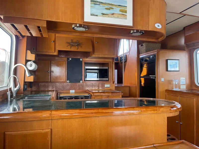 Slide: The Image of Luxurious wooden kitchen interior of 2002 Transpacific Marine EAGLE 53 yacht. - 39