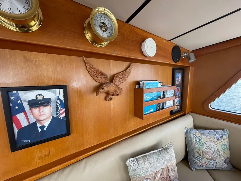 Slide: The Image of Interior of 2002 Transpacific Marine EAGLE 53 with nautical decor and framed photo. - 48