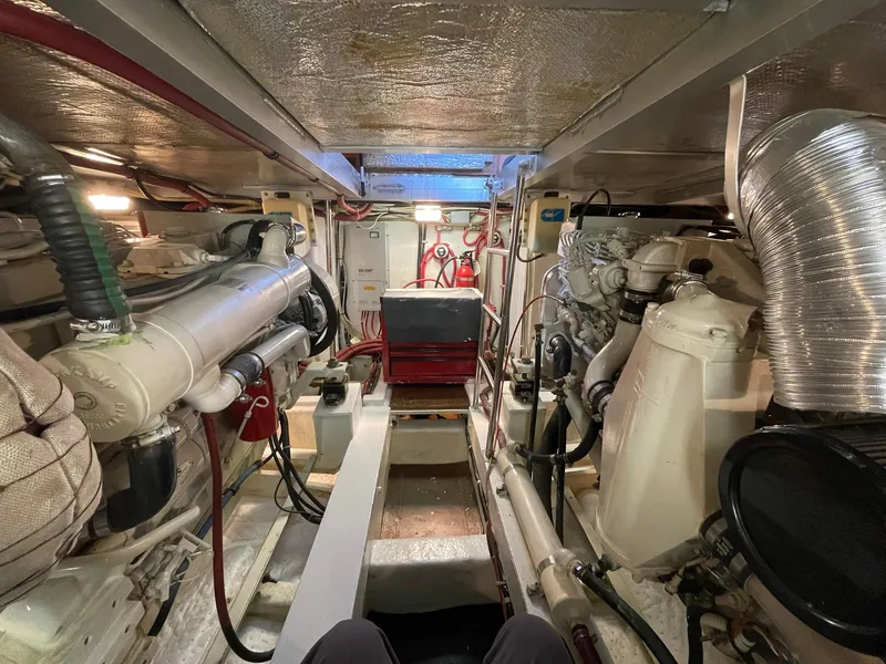 Slide: The Image of Engine room of 2002 Transpacific Marine EAGLE 53 yacht, showcasing mechanical components. - 5