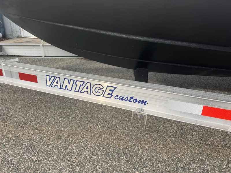 Slide: The Image of Trailer for 2019 Robalo R222 Center Console boat, featuring Vantage custom branding. - 28