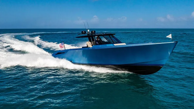 Slide: The Image of 2022 Wajer 55 S luxury yacht cruising on open sea under clear blue sky. - 11