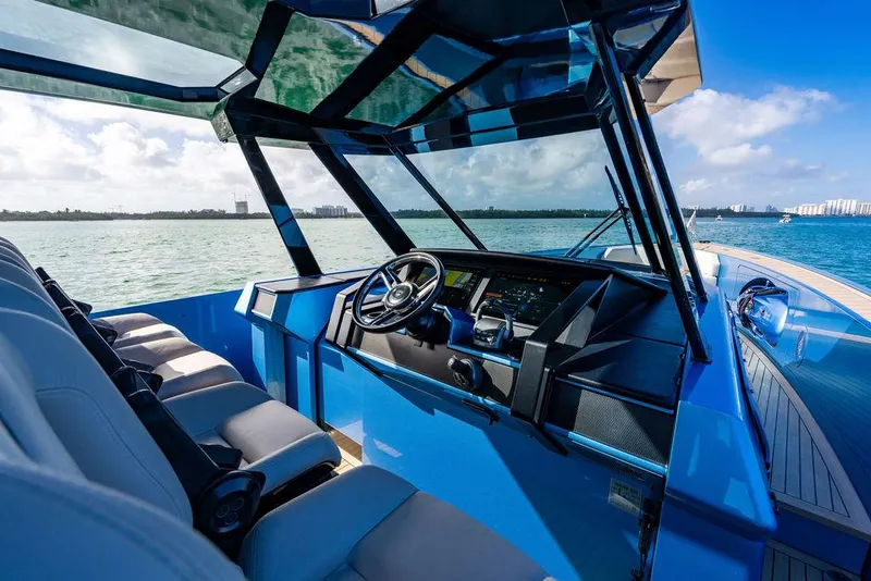 Slide: The Image of 2022 Wajer 55 S yacht cockpit with modern controls and seating, overlooking serene waters. - 26