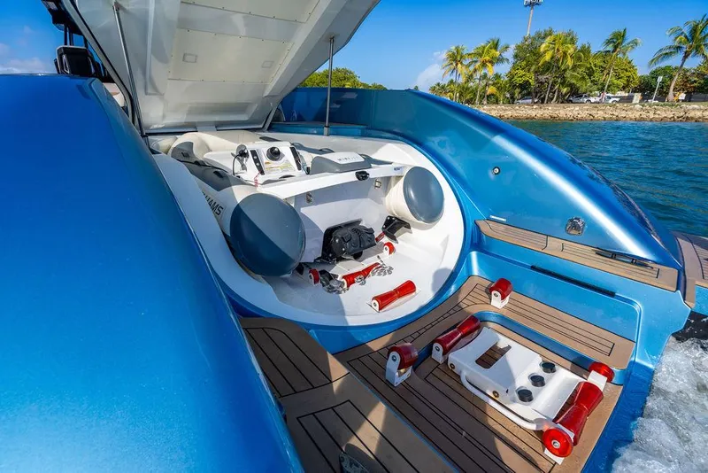 Slide: The Image of 2022 Wajer 55 S yacht with open engine compartment, docked near tropical shoreline. - 29