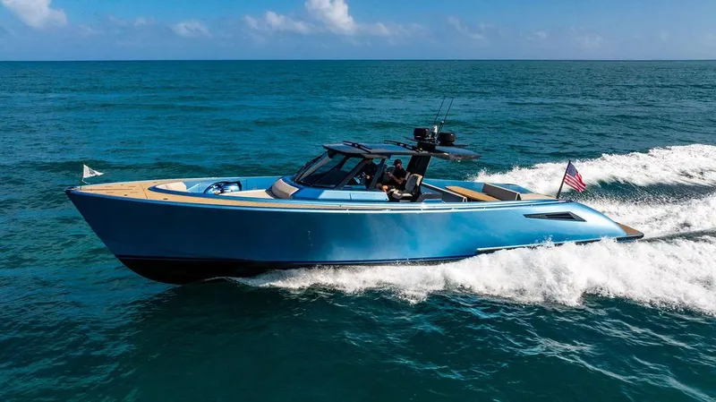 Slide: The Image of 2022 Wajer 55 S yacht cruising on open sea, showcasing sleek design and luxury. - 4