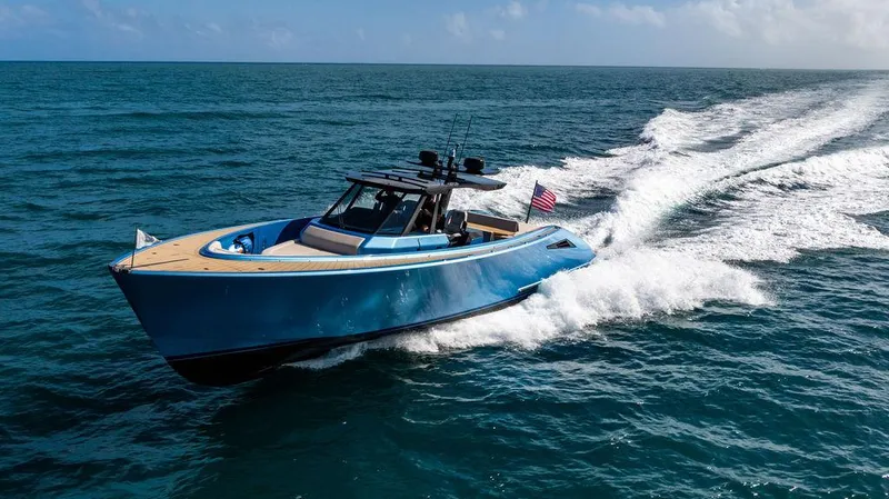 Slide: The Image of 2022 Wajer 55 S yacht cruising on open sea, showcasing sleek design and performance. - 5