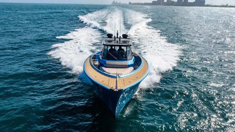 Slide: The Image of 2022 Wajer 55 S yacht cruising on open sea, showcasing sleek design and powerful performance. - 6