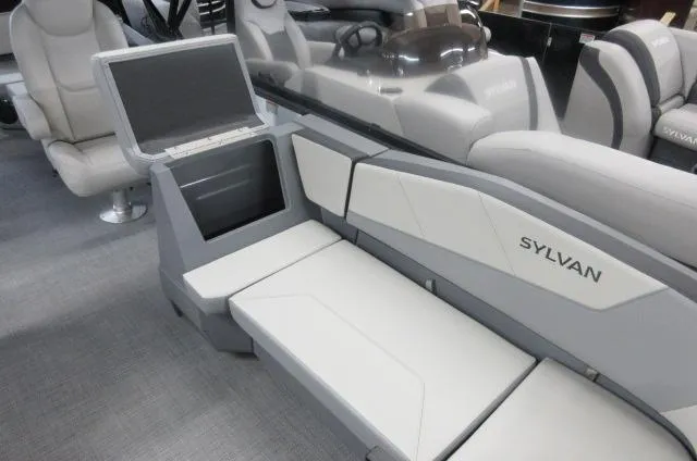 Slide: The Image of Interior of 2025 Sylvan A-20 LZ DH boat with modern seating and sleek design. - 6